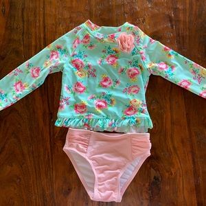 SOLD.    Little Me 2 piece long sleeved swim suit Size 2T